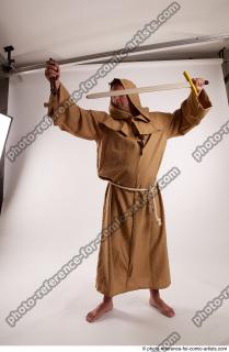 10 2018 01 JOEL ADAMSON MONK WITH CRUCIFIX AND SWORD